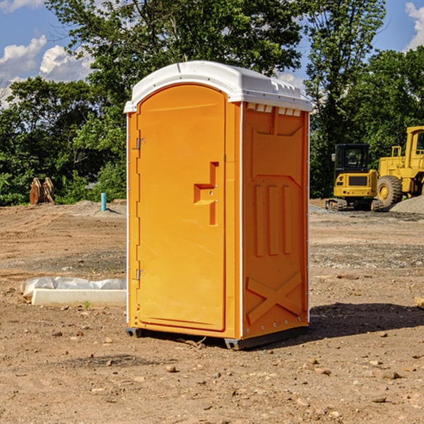 how often are the porta potties cleaned and serviced during a rental period in Baltic